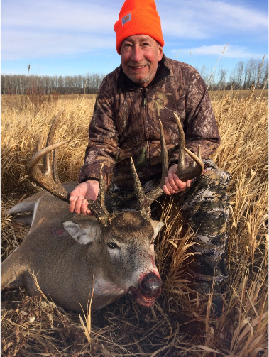 Hunter with Trophy Buck